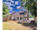 Spacious backyard with a large deck, perfect for outdoor entertaining and relaxation at 9630 N Cardinal Dr, Ladson, SC 29456