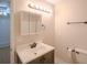 Bathroom featuring vanity with mirror, good lighting, towel bar and convenient toilet paper holder at 9630 N Cardinal Dr, Ladson, SC 29456