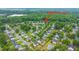 Neighborhood aerial view shows lush landscaping and mature trees near the property at 9636 Pebble Creek Blvd, Summerville, SC 29485