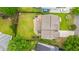 Aerial backyard view features a brick patio with outdoor seating and a private yard at 9636 Pebble Creek Blvd, Summerville, SC 29485