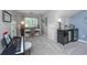 Functional bonus room includes a desk, piano, and beverage center, offering versatile space at 9636 Pebble Creek Blvd, Summerville, SC 29485