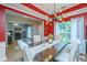 Elegant dining room featuring a modern light fixture and access to an adjacent living space at 9636 Pebble Creek Blvd, Summerville, SC 29485