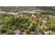 Aerial view of home nestled within a wooded area and suburban neighborhood at 9666 Jamison Rd, Ladson, SC 29456