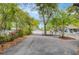 Long paved driveway leads to the two-car garage and the house at 9666 Jamison Rd, Ladson, SC 29456