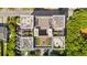 Aerial view showing rooftop patios and parking surrounding a modern condo building at 1 Cool Blow St # 344, Charleston, SC 29403