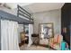 Stylish bedroom featuring a loft bed, closet, and a full-length mirror at 1 Cool Blow St # 344, Charleston, SC 29403