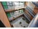 Interior courtyard view featuring upper apartment entryways and outdoor stairwells at 1 Cool Blow St # 344, Charleston, SC 29403