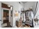 Hallway leading to closet with wooden dresser and hanging clothes at 1 Cool Blow St # 344, Charleston, SC 29403