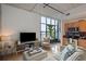 Open floor plan with modern living room featuring a spacious sitting area and a kitchen at 1 Cool Blow St # 344, Charleston, SC 29403