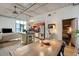 Spacious living space featuring an open floor plan, modern kitchen, and dining area with wood floors at 1 Cool Blow St # 344, Charleston, SC 29403