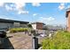 An inviting rooftop patio with dining seating and lush greenery offers a relaxing outdoor space at 1 Cool Blow St # 344, Charleston, SC 29403
