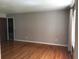 Neutral living room featuring hardwood floors and white trim at 1010 Foxcroft Rd, Charleston, SC 29412
