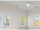 This light-filled bedroom features natural light and an overhead ceiling fan at 1014 Alamo St, North Charleston, SC 29405