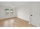 Clean and bright bedroom with hardwood floors, natural light and neutral paint at 1014 Alamo St, North Charleston, SC 29405