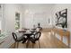 This dining room offers hardwood floors and neutral walls at 1014 Alamo St, North Charleston, SC 29405