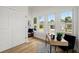 Bright office space boasting natural light from windows, built-in bench and a modern desk at 1014 Alamo St, North Charleston, SC 29405