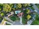 Aerial shot of a neighborhood featuring beautiful homes with well-maintained landscaping and a swimming pool at 102 Six Point Ct, Goose Creek, SC 29445