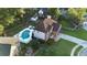 Aerial view of home with an inviting backyard pool and lush landscaping providing privacy and beauty at 102 Six Point Ct, Goose Creek, SC 29445