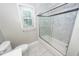 The bathroom features a marble shower, tiled floor, and a bright window at 102 Six Point Ct, Goose Creek, SC 29445