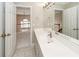A bathroom featuring a vanity and sink with a view into another room at 102 Six Point Ct, Goose Creek, SC 29445