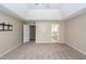 Spacious Primary bedroom with plush carpeting, tray ceiling and walk-in closet and en-suite bathroom at 102 Six Point Ct, Goose Creek, SC 29445