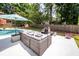 Outdoor patio area with comfortable seating, a fire pit, and a view of the pool at 102 Six Point Ct, Goose Creek, SC 29445