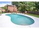 Backyard pool and patio with lounge chairs surrounded by trees at 102 Six Point Ct, Goose Creek, SC 29445