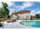 Lovely backyard featuring a pool, patio area, seating, and a well-maintained lawn at 102 Six Point Ct, Goose Creek, SC 29445