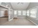 Bright sunroom with door to the outside, and a glimpse of the main living area at 102 Six Point Ct, Goose Creek, SC 29445