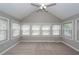 Light-filled sunroom with vaulted ceilings and multiple windows at 102 Six Point Ct, Goose Creek, SC 29445