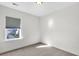 Simple bedroom featuring cozy carpet and a window offering bright natural lighting to the room at 105 Archdale St, Summerville, SC 29486