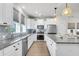 Modern kitchen featuring granite countertops, stainless steel appliances, and bright natural lighting at 105 Archdale St, Summerville, SC 29486