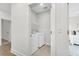Convenient laundry room features a modern washer and dryer, ensuring hassle-free laundry days at 105 Archdale St, Summerville, SC 29486