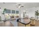 Bright living room showcasing comfortable seating, natural light, and a modern design at 105 Archdale St, Summerville, SC 29486
