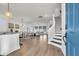 Bright, open-concept living space featuring modern decor and hardwood floors throughout the house at 105 Archdale St, Summerville, SC 29486