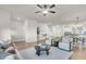 Spacious living area with modern furniture and décor, open to the kitchen and dining space at 105 Archdale St, Summerville, SC 29486
