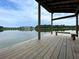 Bench and scenic view of the lake from the community pier at 105 Archdale St, Summerville, SC 29486