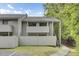 Charming exterior view of the home showcasing a fenced yard and a cozy balcony on the second floor at 108 Greenmeadow Dr, Goose Creek, SC 29445
