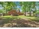 Large backyard featuring a above-ground pool, storage shed and mature trees at 109 Williams Ct, Goose Creek, SC 29445