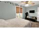 This bedroom offers natural light, a ceiling fan and ample space at 109 Williams Ct, Goose Creek, SC 29445