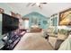 Open living room featuring vaulted ceilings, ample seating, and large windows at 109 Williams Ct, Goose Creek, SC 29445