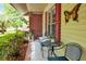 Inviting front porch with comfortable seating, plants, and charming decorative elements at 109 Williams Ct, Goose Creek, SC 29445