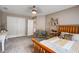 Bright bedroom with a cozy bed, workspace, and neutral colors at 113 Ashton Cv, Summerville, SC 29485