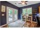 Bright dining area features French doors, hardwood floors, and access to outdoor space at 113 Ashton Cv, Summerville, SC 29485
