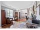 Bright living room with hardwood floors, comfortable seating, and arched doorways at 113 Ashton Cv, Summerville, SC 29485