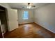 Cozy bedroom with closet, hardwood floors and natural lighting at 113 Germantown Rd, Summerville, SC 29483