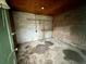 Unfinished shed interior shows concrete floor, brick and block walls, and rustic wood accents at 113 Germantown Rd, Summerville, SC 29483