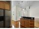 Functional kitchen featuring a breakfast bar, hardwood floors, and stainless steel appliances at 1150 Quick Rabbit Loop, Charleston, SC 29414