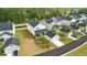 A beautiful view of a backyard with garage and patio. A beautiful neighborhood with a well manicured street at 117 Osprey Ridge Ln, Summerville, SC 29483