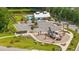 Aerial view of community amenities featuring a unique playground, pool and lounge, and parking area at 117 Osprey Ridge Ln, Summerville, SC 29483